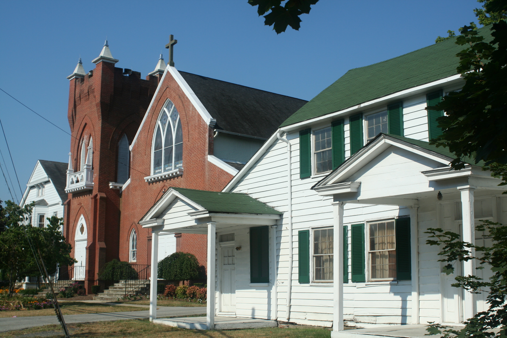 Historic brick church and white clapboard homes on Main Street in Upper Marlboro, Maryland